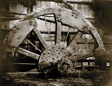 Renovations to the Brandywine Rolling Mill in 1834 included a new flywheel to improve rolling efficiency.