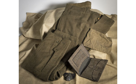 Uniform trousers, wallet/billfold, button & cloth bag owned by Fred Strickland — Courtesy of Bob Ford