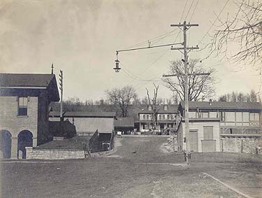 Left: PRR passenger station, Coatesville, PA. Center: Moses Coates' new home, 1809. Photo by Geo. G. Kacy, 1911.  This house was demolished when the Third Avenue underpass was constructed in 1911.