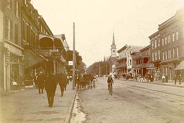 Main Street, ca. 1905, looking east. An atmospheric view typical of the horse and buggy era.